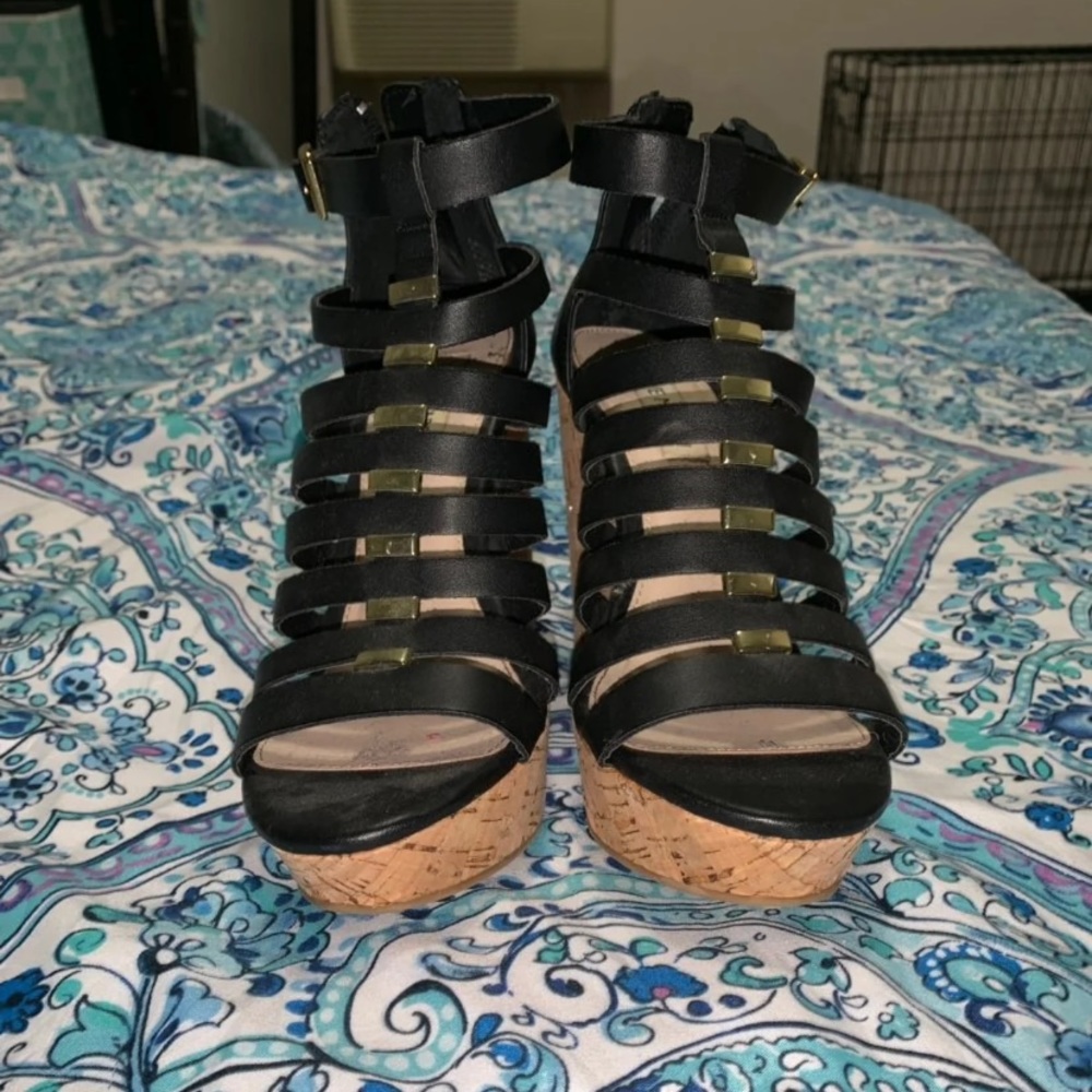 Women’s black leather wedges